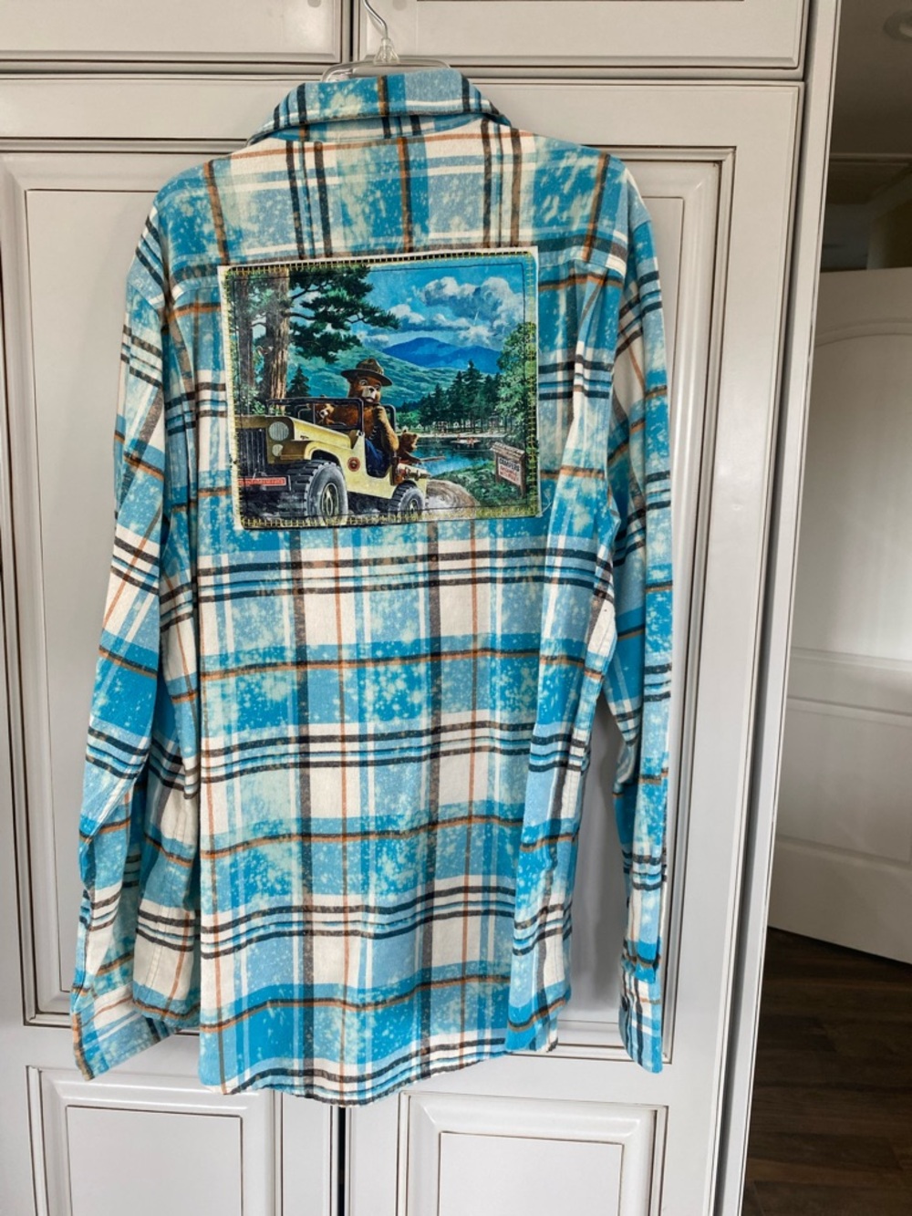 Casual Blue Plaid Button-Down Shirt with Scenic Back Patch
